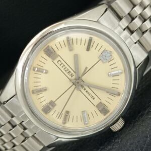 Vintage 1981 Citizen Manual Mens Silver Watch & Beige accents